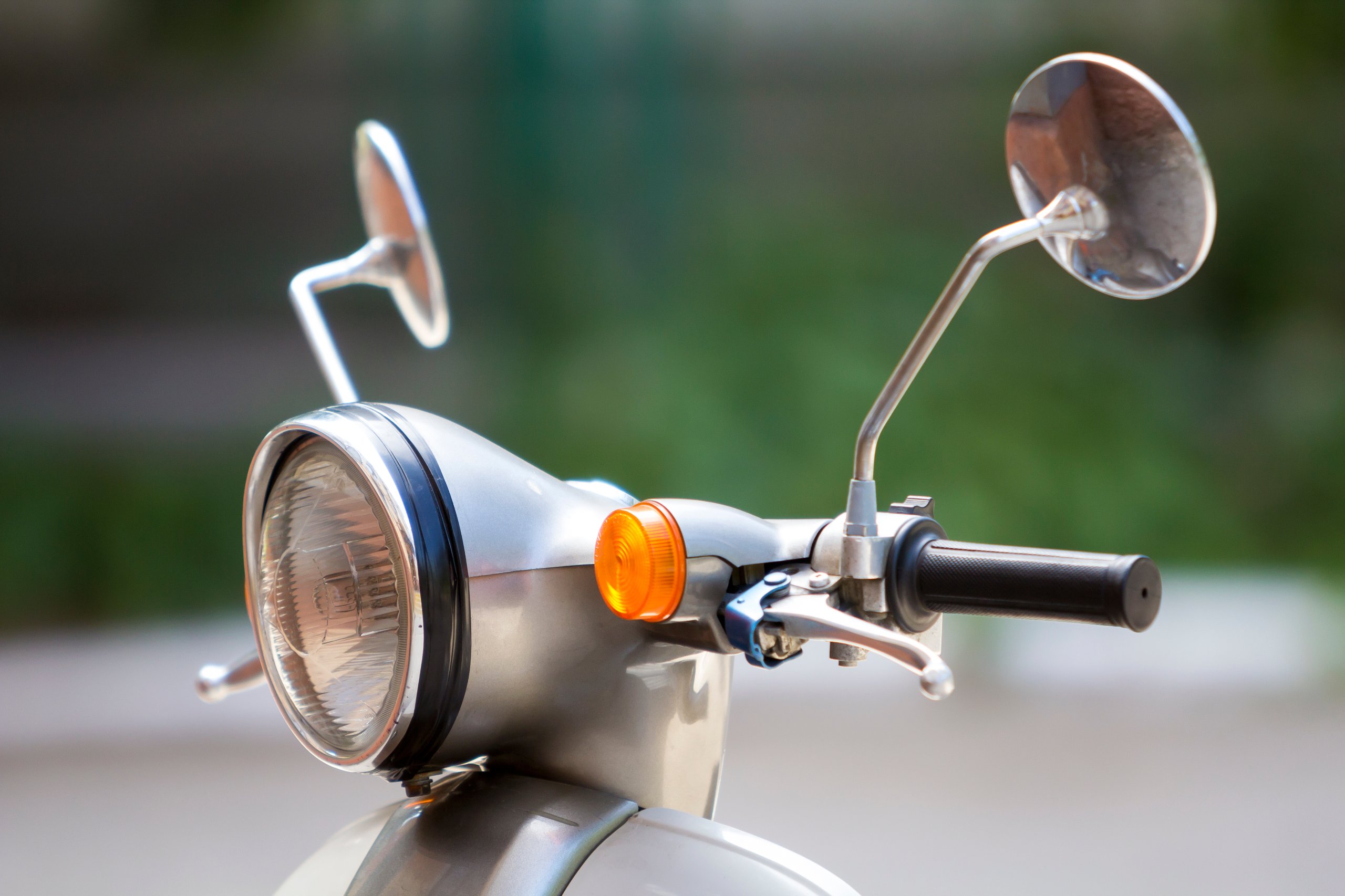 close up of moped handlebars