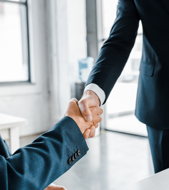Lawyer and client shaking hands over an agreement