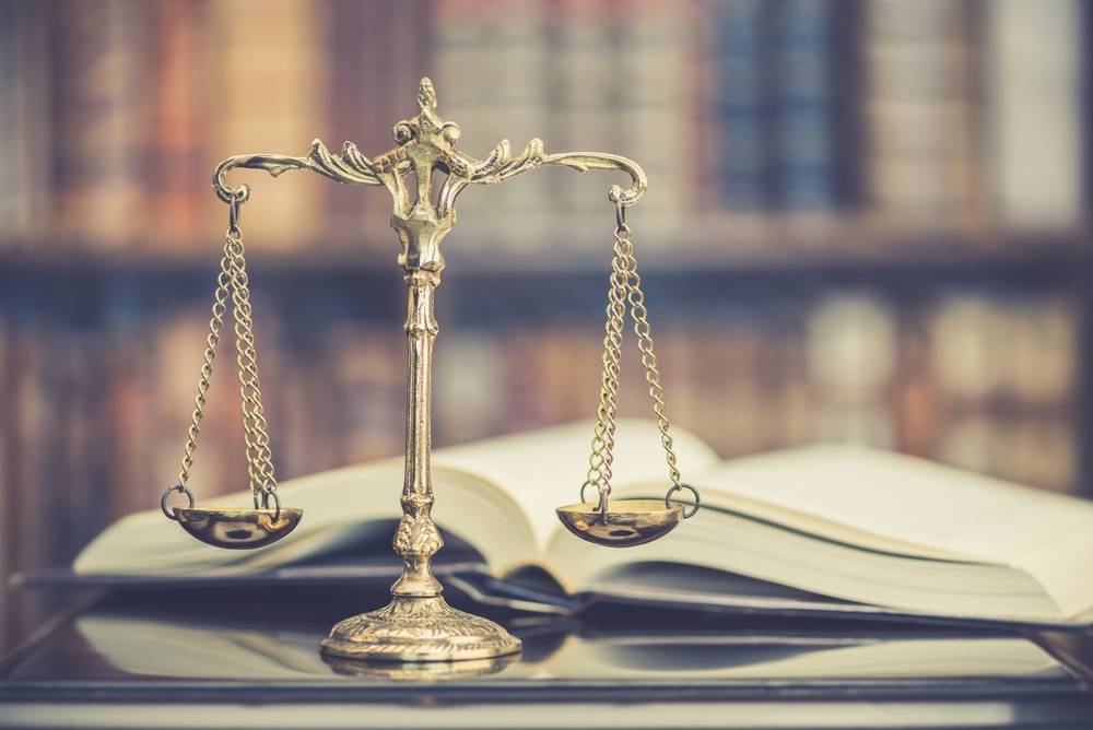 Photo of scales and book