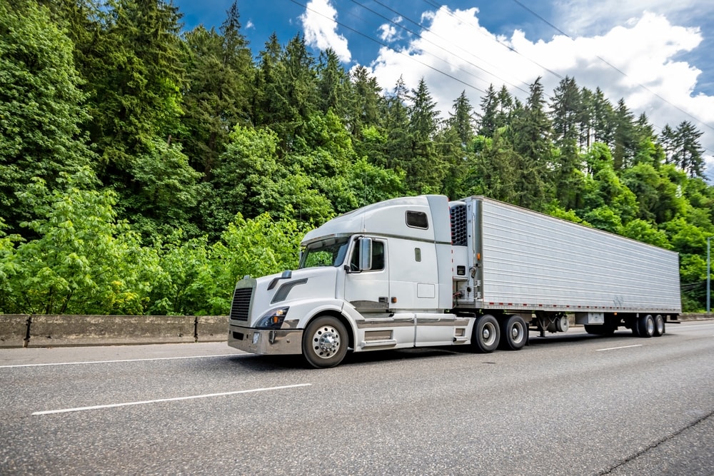 White semi-trailer truck in motion