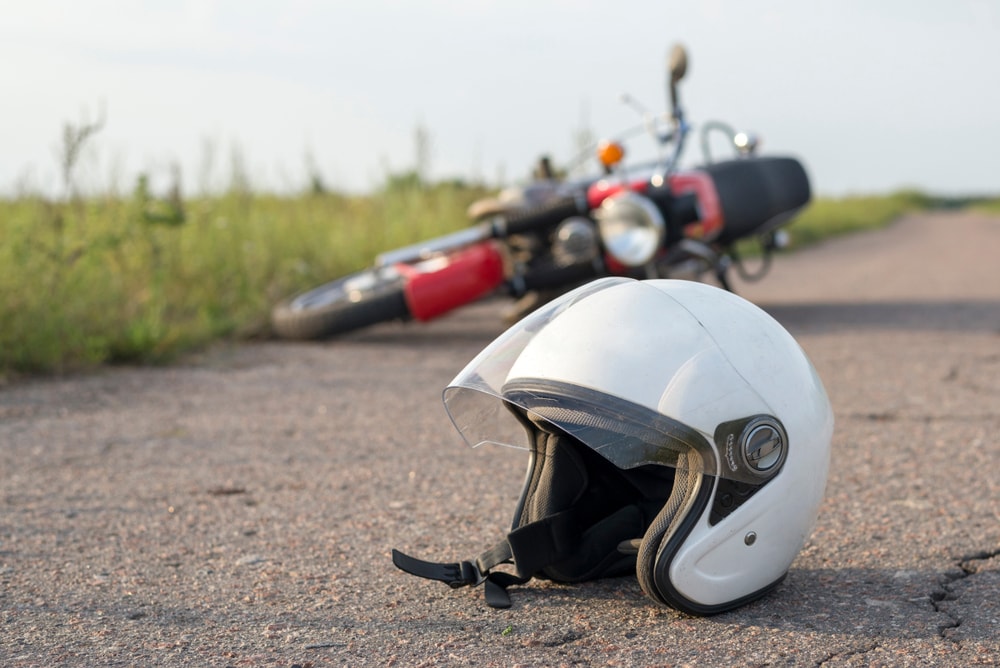 Closeup of helmet on road after a motorcycle accident