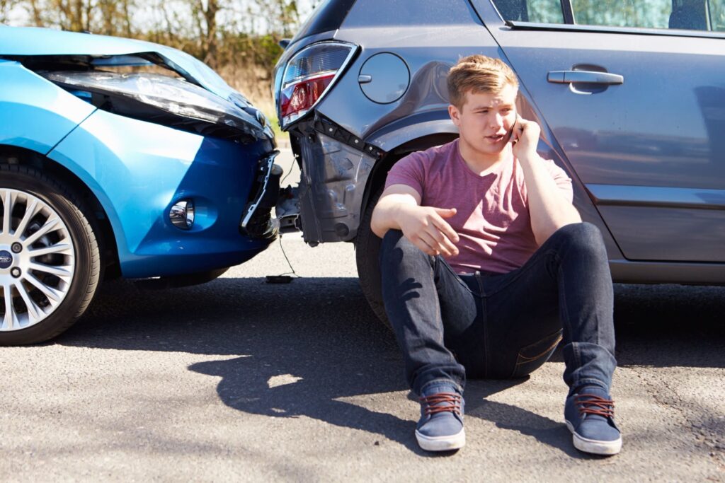 Person calling lawyer after accident