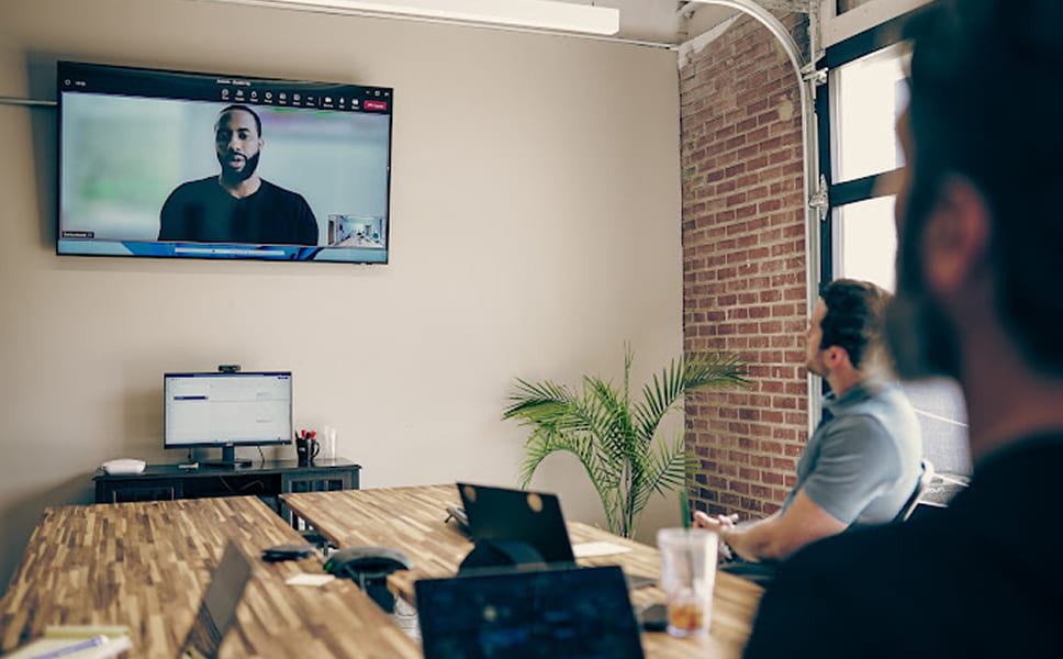 Photo of Armada Law lawyers in meeting room