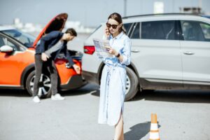 Woman checking her's car insurance paperwork