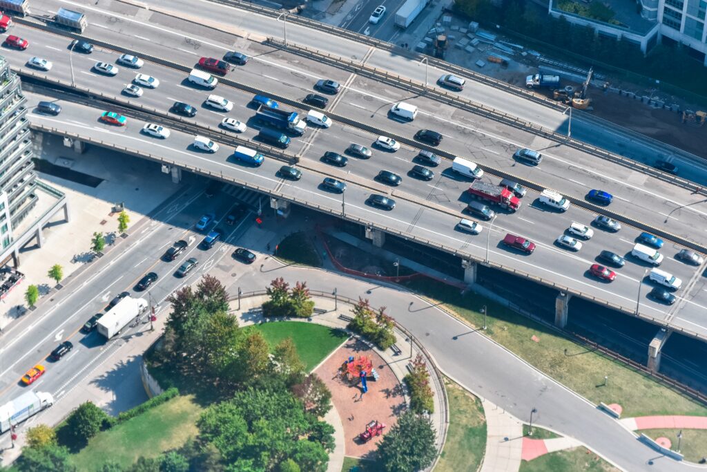 A high angle shot of a highway full of cars
